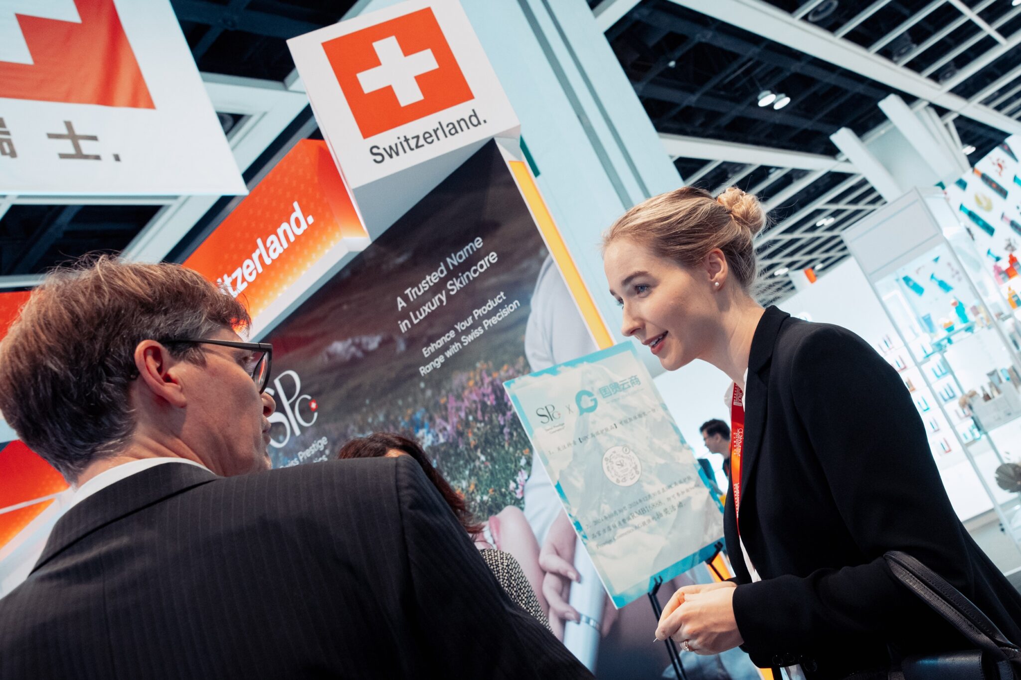Buyers at the Switzerland pavilion &mdash; national pavilions are a Cosmoprof Asia hallmark.