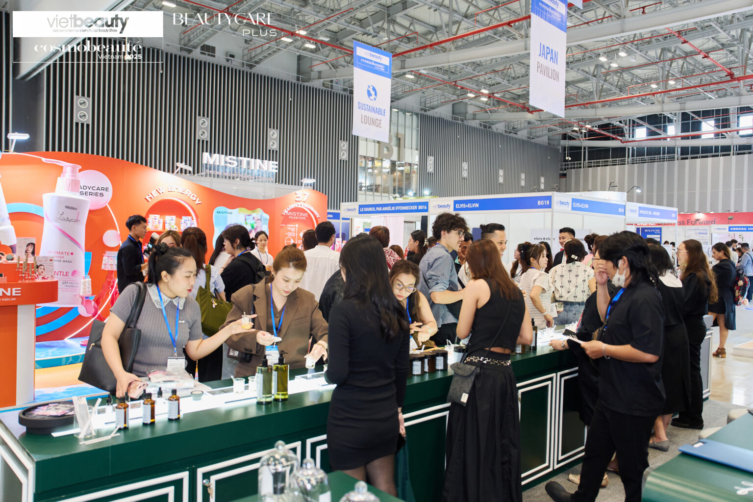 Busy aisles by the Japan pavilion and Sustainable Lounge at the 2025 edition.